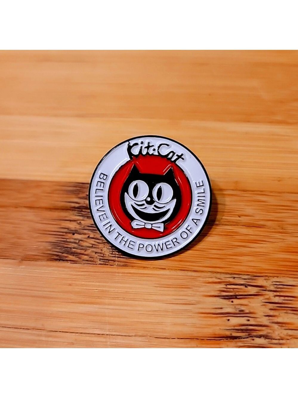 Kit-Cat Klock enamel pin